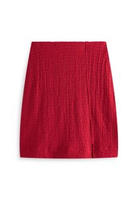 Gonna mini rossa lavorata a maglia con un motivo testurizzato, caratterizzata da uno spacco laterale. Finitura liscia, taglio dritto, adatta per un look casual.