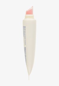 Lip balm in a tapered, matte white container with a slight glossy pink balm tip. Features blue text detailing natural origin content.