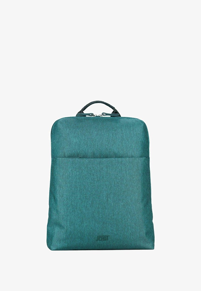 Sac à dos en nylon teal de forme rectangulaire, texture lisse, avec une poignée supérieure et une poche zippée à l'avant. Présente un logo en bas.