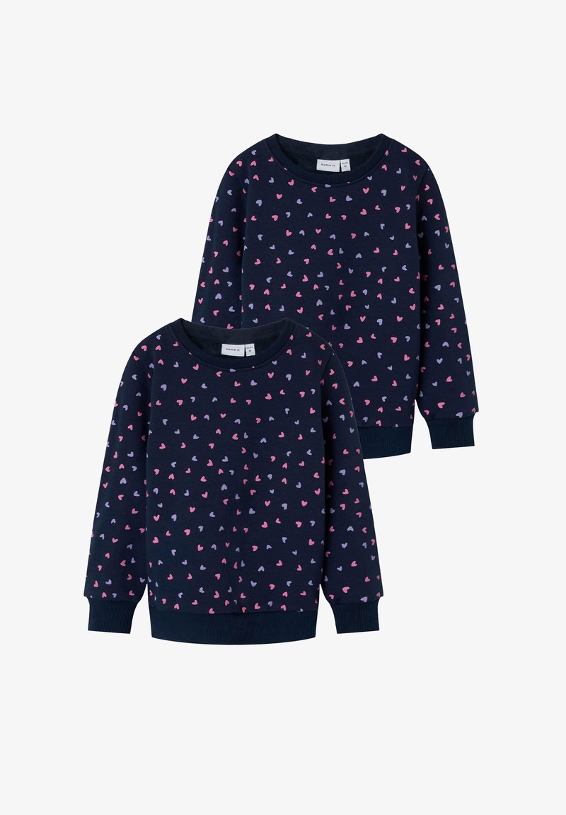 Marineblaue Sweatshirts mit einem Muster aus kleinen pinken und lavendelfarbenen Herzen, Rundhalsausschnitten und gerippten Bündchen und Säumen.