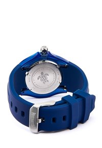 Reloj de silicona azul con una caja transparente azul, fondo de metal y hebilla plateada. Incluye un logotipo de tortuga y una correa ajustable.