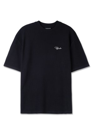 T-shirt nera a maniche corte con un motivo waffle testurizzato e un piccolo logo bianco sul lato sinistro del petto. Collo a girocollo con rifinitura a costine.