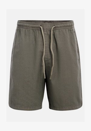 Dark olive elastic waistband shorts with front drawstring and side pockets, made of textured fabric.