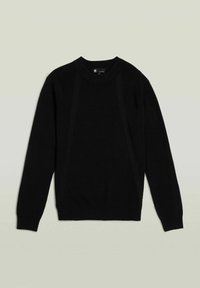 Maglione nero a maglia con collo rotondo, dotato di pannelli laterali testurizzati e polsini e orlo a coste. Tessuto liscio e forma classica.