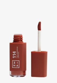 Longwear lipstick in matte orange-brown packaging, with a flat applicator tip. Features a clear base revealing the lipstick inside.