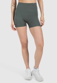 Hoge taille, donkergrijze sportshorts van rekbaar materiaal, voorzien van zijzakken en vlakke naden voor comfort.