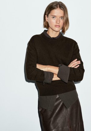 - Sweter