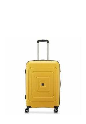 Hard-shell yellow suitcase with a geometric pattern, black accents, a telescopic handle, and four spinner wheels for easy maneuverability.