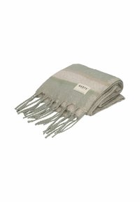 Hellgrünes und cremefarbenes gestreiftes gewebtes Handtuch, mit Fransen und einem kleinen Etikett. Weiche Textur, rechteckige Form, leichtes Design.