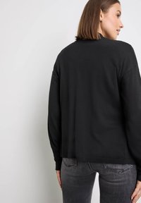 Taifun Strickjacke - schwarz