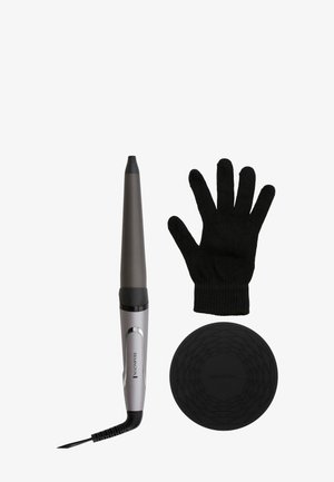 Tenaza rizadora con un barril cónico en gris metálico, incluye un guante negro resistente al calor y un tapete de silicona redondo con una superficie texturizada.