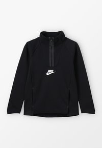 Zwarte Nike half-zip sweatshirt met lange mouwen. Heeft een klein wit logo op de borst en stiksels langs de naden.