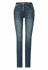 Vaqueros ajustados en denim de lavado oscuro. Presentan un cierre de cremallera con botón, cinco bolsillos y costuras en contraste. Textura suave, corte entallado.