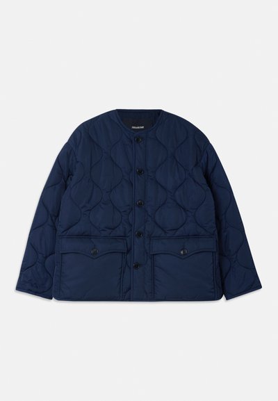Navy quilted jacket featuring a round neckline, front button closure, and two lower pockets with flaps. Smooth texture, warm insulation.