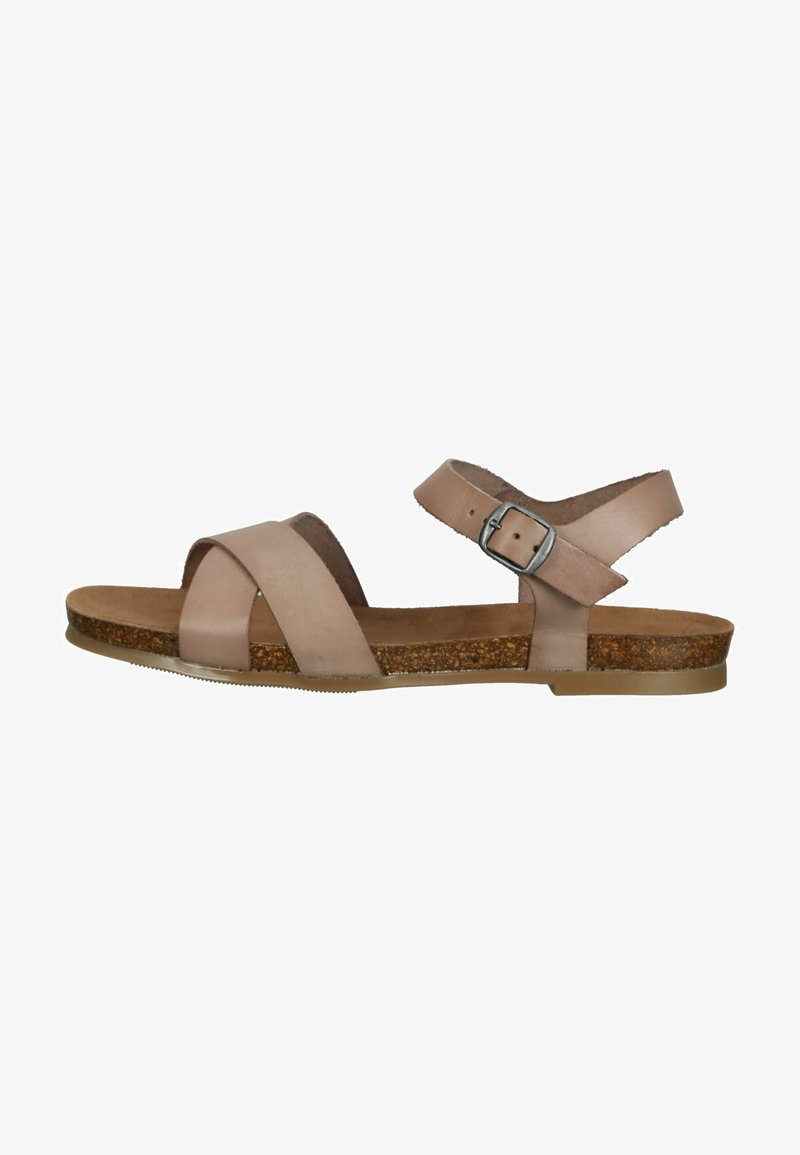 Brun lædersandal med tværbånd, justerbar ankelrem, korkfodseng og gummisål, der har et minimalistisk design.