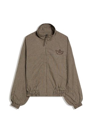 Brun og sort ternet jakke med lynlås, høj krave, elastiske manchetter og indsnævret talje, med et lille broderet logo på brystet.