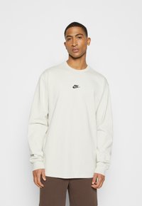 Nike Sportswear PREM ESSNTL SUST - Camisola de manga comprida - light bone/black