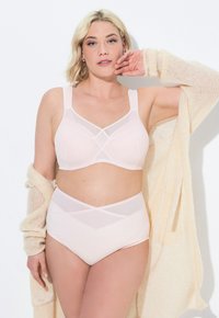 Light pink bra and high-waisted panties with a mesh overlay, featuring cross patterns. The material appears soft, with wide straps.