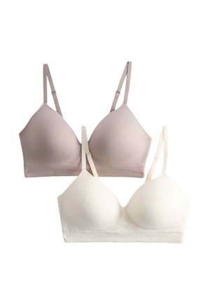 Deux soutiens-gorge sans couture sans armatures, un beige et un blanc, avec des bretelles réglables sur fond blanc.