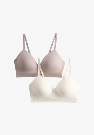 Due reggiseni wireless senza cuciture, uno beige e uno bianco, con spalline regolabili su sfondo bianco.