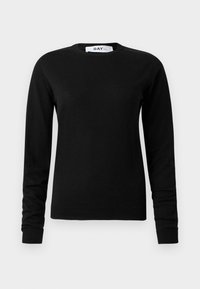 Svart genser med lange ermer laget av et mykt materiale, med rund hals og ribbestrikkede mansjetter og kant. Minimalistisk design uten mønstre.