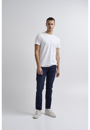 Jeans slim fit - lavscuro