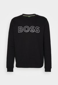 Černá mikina s nápisem "BOSS" velkými bílými písmeny na přední straně. Vyrobena z měkkého materiálu s žebrovanými manžetami a výstřihem.