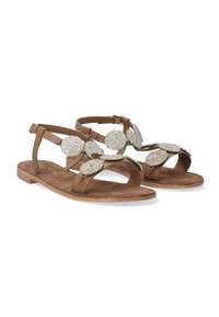 Braune Leder-Sandalen verfügen über runde, mit Kristallen verzierte Applikationen an den Riemen, mit flachen Sohlen und einem offenen Zehendesign.