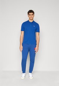 HUGO DONOS - Polokošeľa - medium blue