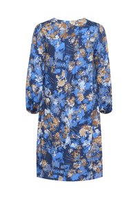 Bloemenjurk met een blauw en bruin patroon op een donkere achtergrond, met lange mouwen en een ontspannen pasvorm, gemaakt van lichte stof.