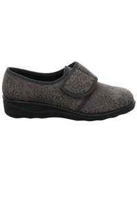 Gray floral-patterned shoe with a hook-and-loop strap and black rubber sole. Features a rounded toe and soft textured upper material.