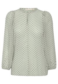 Blouse vert clair transparente avec de longues manches bouffantes, petit motif à pois noirs, encolure ronde avec fente devant, et poignets élastiqués.