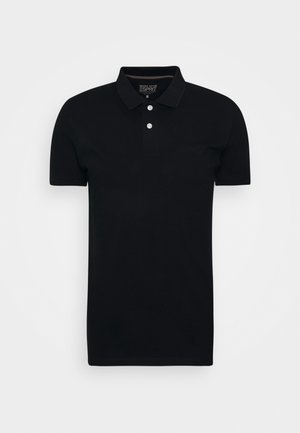 Polo noir en coton, avec une patte de boutonnage à trois boutons et des manches courtes. Logo subtil sur la poitrine gauche.