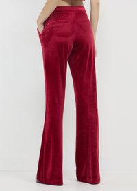 Calliope CINIGLIA - Trousers - rosso