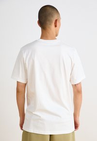 Nike Sportswear AIR GRAPHIC TEE - Marškinėliai su spaudiniu - white/(black)