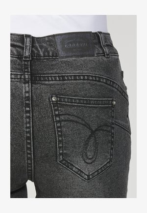 Koroshi LONG  - Liibuvad teksad - black denim