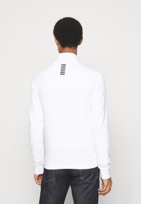 EA7 Emporio Armani Cipzáras pulóver - white
