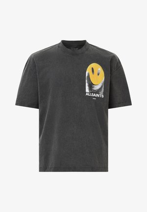 Donkergrijze katoen T-shirt met een ronde halslijn, voorzien van een gele smiley graphic en zwarte accenten aan de voorkant. Ontwerp met een relaxed fit.