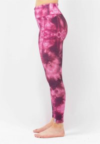 High-waisted leggings in a pink tie-dye pattern with varying shades, featuring a smooth texture and a fitted design.