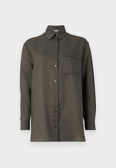 Dark green long-sleeve shirt in lightweight fabric with a button-up front, pointed collar, and a chest pocket featuring an embroidered logo.