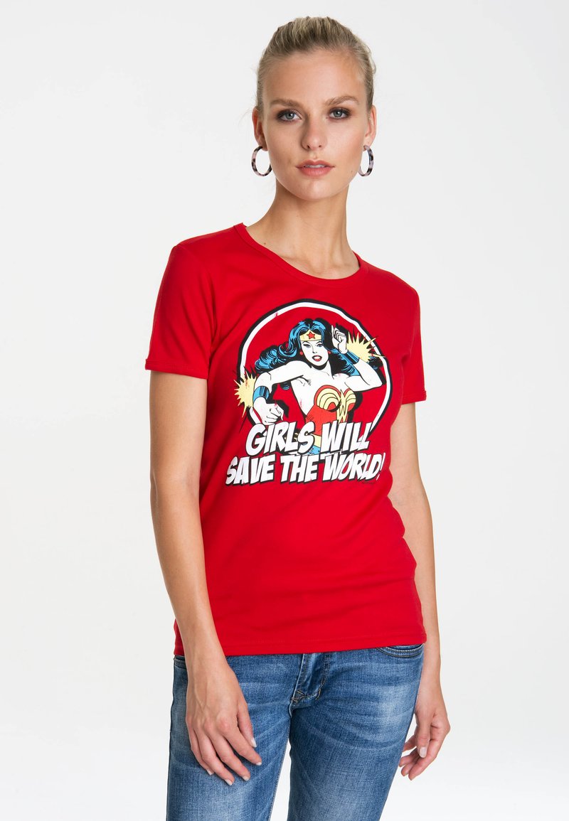 Red cotton t-shirt with a round neck featuring a printed graphic of a female superhero and the text "GIRLS WILL SAVE THE WORLD!"