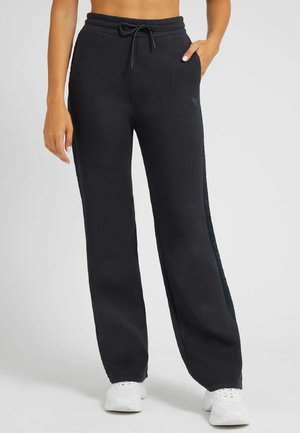 BRENDA - Tracksuit bottoms - blau
