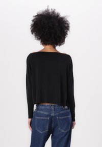 DRYKORN SOMY - Pikkade varrukatega topp - black