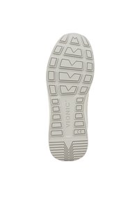 Semelle en caoutchouc blanc avec un motif de semelle profond. Présente des sections proéminentes de formes variées et une surface texturée pour adhérence.