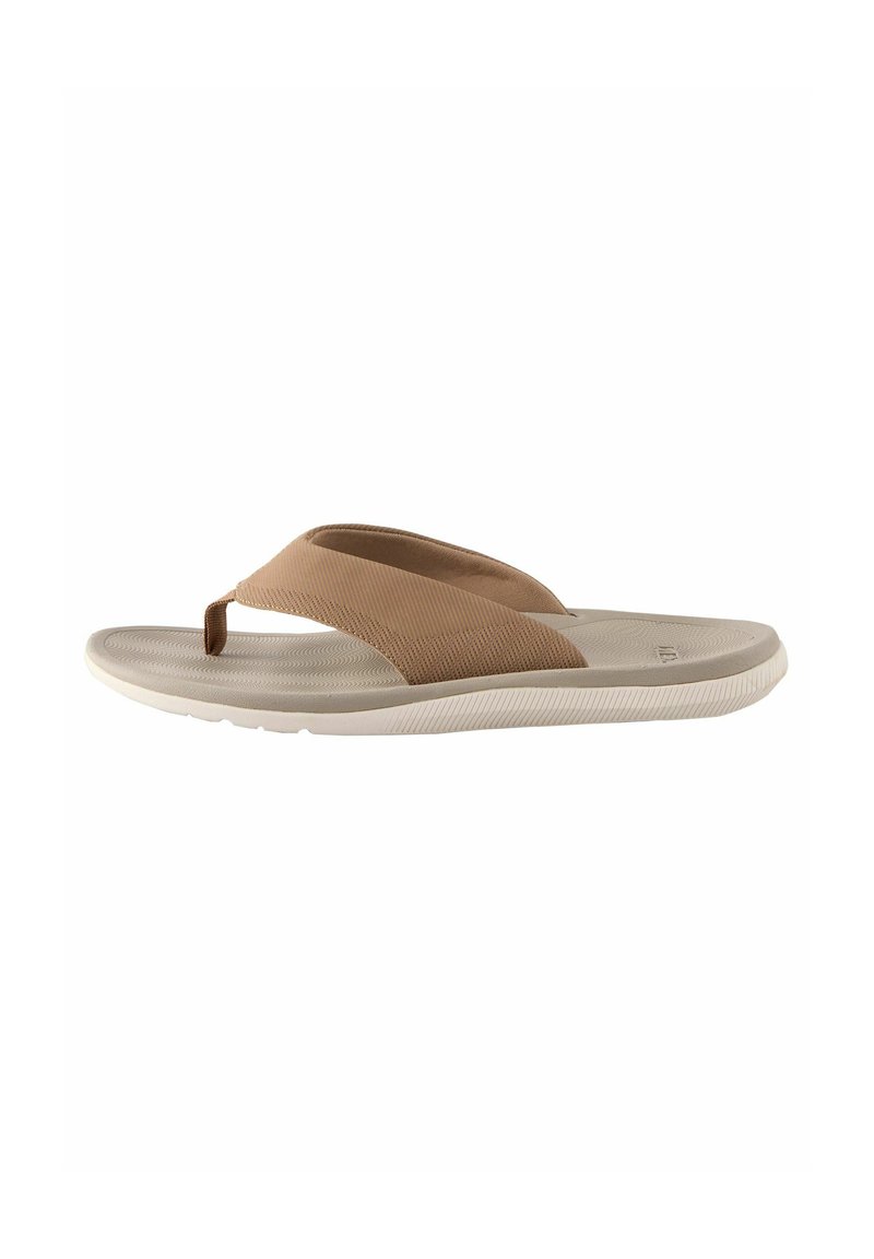Pruun flip-flop sandaal tekstureeritud rihmaga ja helebeez sole, millel on varbaaas ja mustriline jalaplaat pidamiseks.