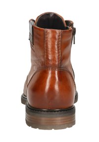 Braune Leder-Ankle-Boots mit glatter Oberfläche, runder Zehe und seitlichem Reißverschluss. Die Sohle besteht aus Gummi mit leichter Struktur und gestapeltem Detail.
