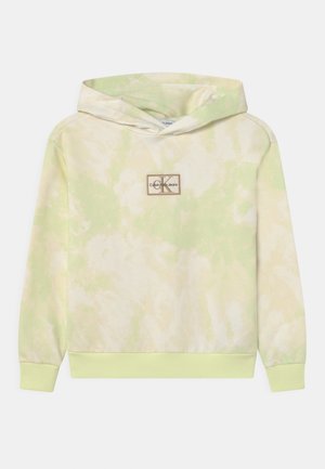 Tie-dye light green and beige hoodie with front patch logo reading "Calvin Klein Jeans" and ribbed cuffs and hem.