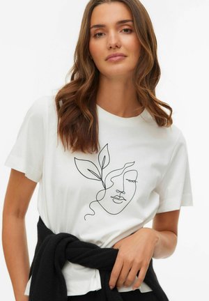 White cotton t-shirt featuring a minimalist black line drawing of a face with a leaf. Soft texture, round neckline, and short sleeves.