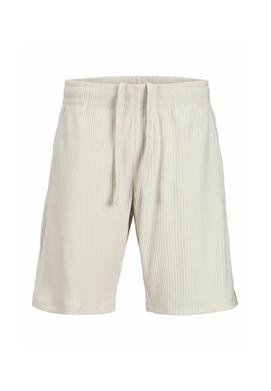 Shorts beige clair avec texture côtelée verticale, taille élastique et cordon externe. Pas de poches ni d'ornements supplémentaires.
