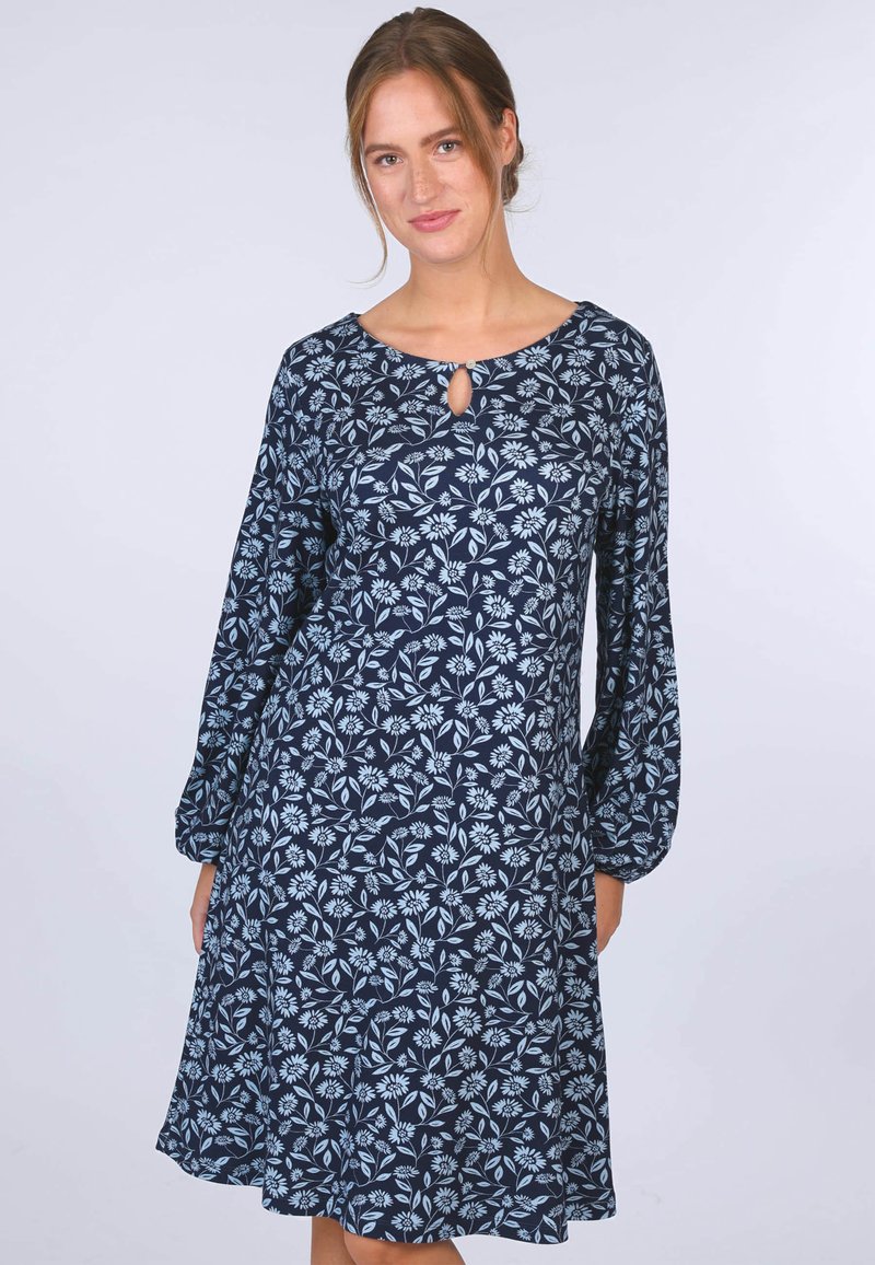 Navyblaues Spitzenkleid mit langen, gepufften Ärmeln und einem Schlüsselloch-Ausschnitt. Leichter Stoff mit lockerer Passform, der am Saum ausgestellt ist.